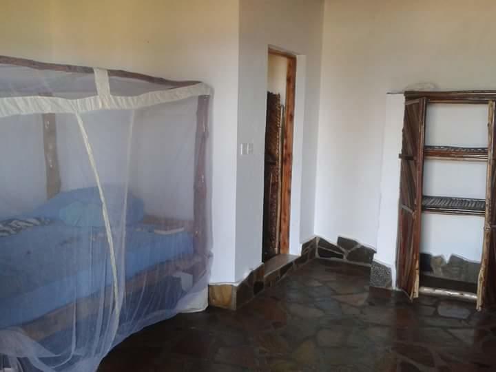 Mango Lodge Msambweni Kisimachande Buitenkant foto